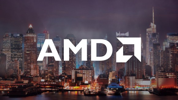 A white AMD logo against a dark city skyline.
