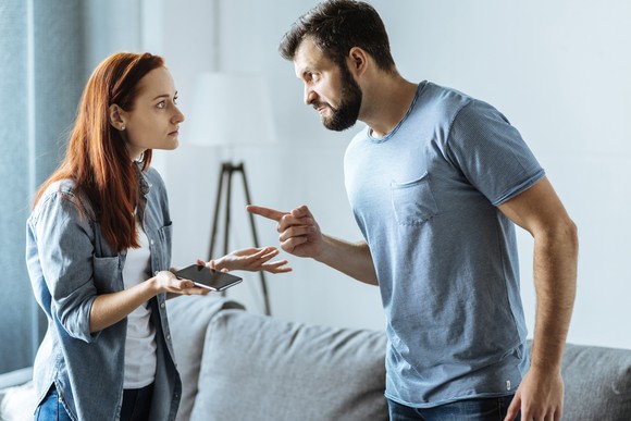 A man and a woman appear to be arguing.
