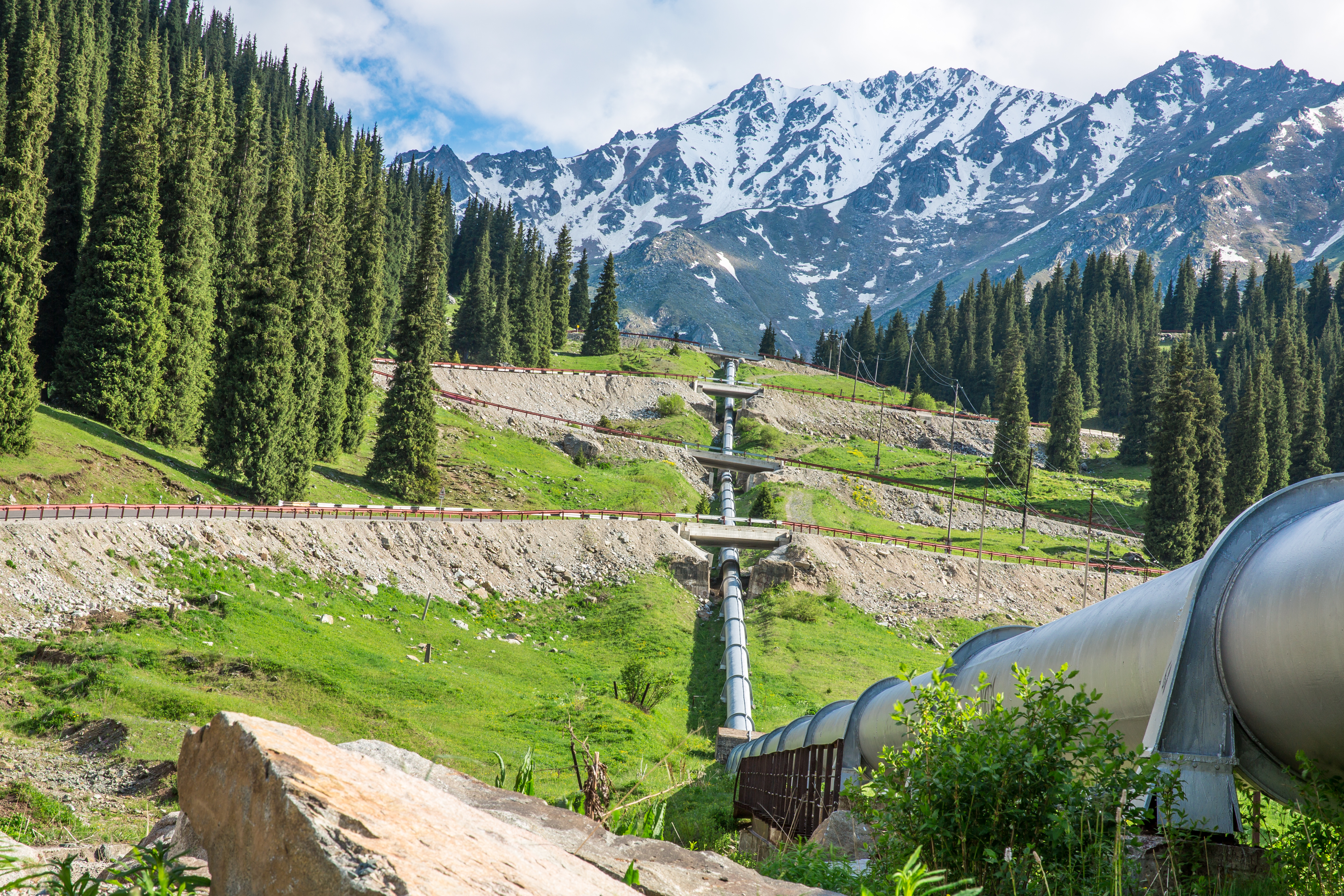 A pipeline traveling through the mountains.