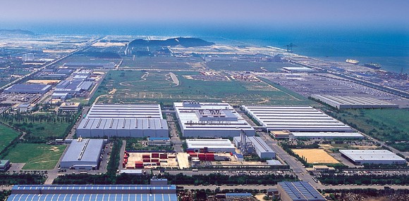 An aerial view of GM's Gunsan factory complex, including sevearl large buildings and a test track.