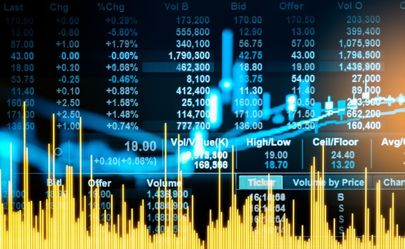 A blue stock chart with numbers in the background and yellow line graphs.