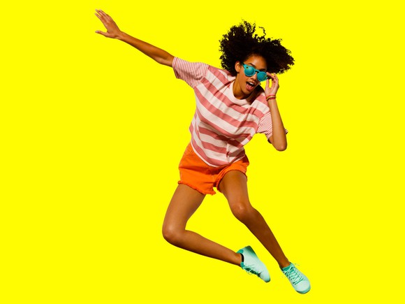 Girl wearing Snap's Spectacles in motion