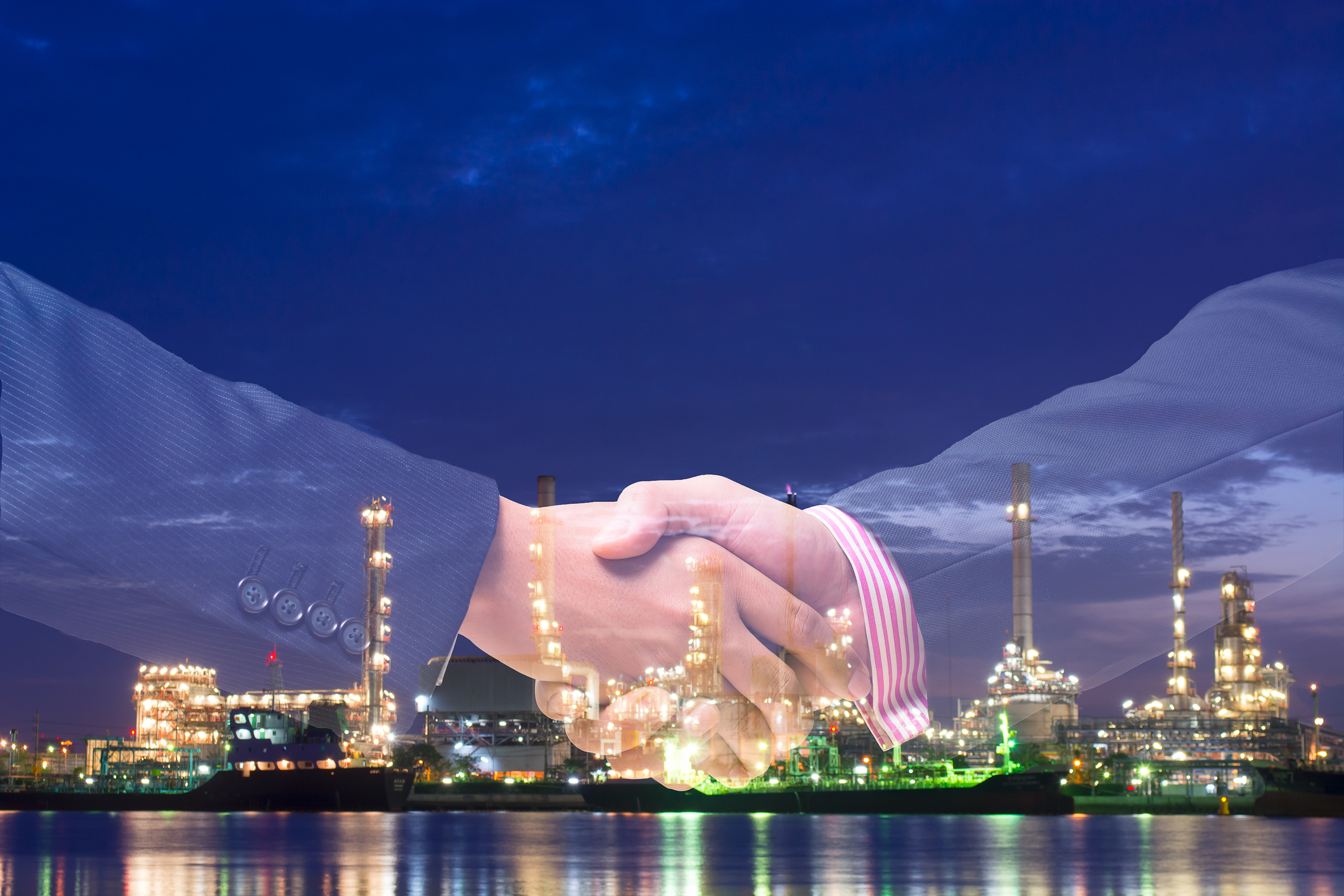 Double exposure of handshake and refinery plant