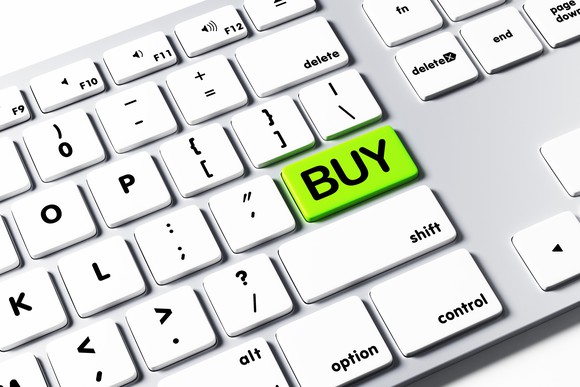 a keyboard with buy button on it
