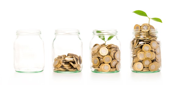 Gold coins growing in four jars, with seedlings growing out of two jars.