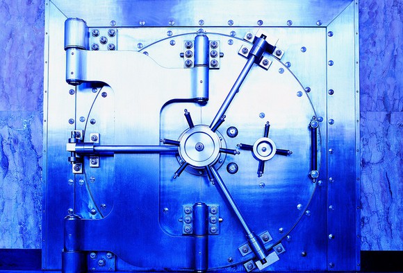 Large steel vault door with blue tones