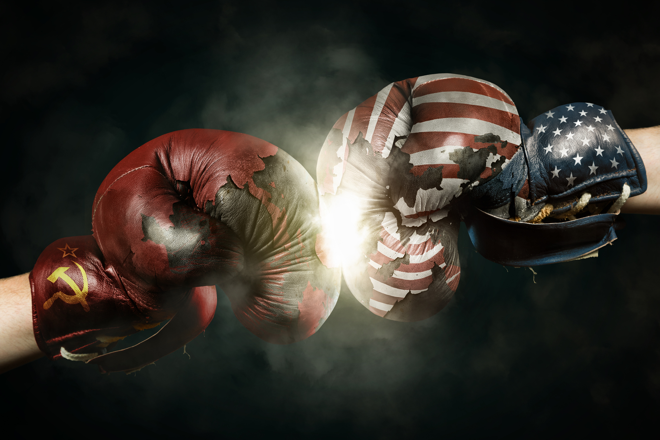 Hands with boxing gloves representing Russia and the U.S.