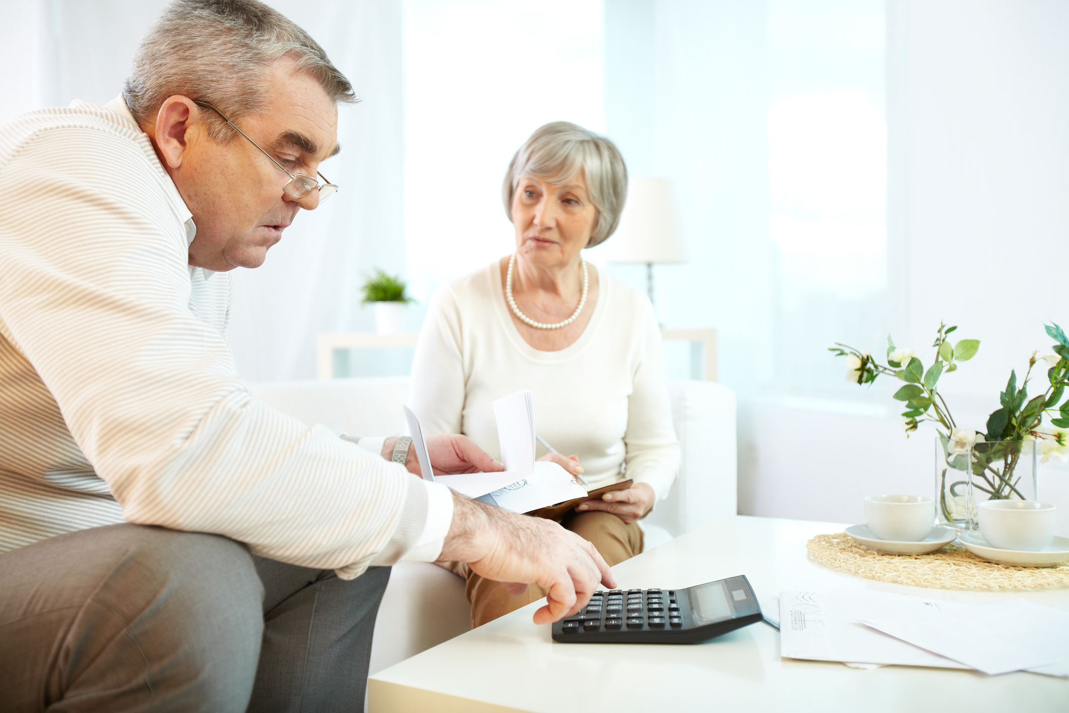 An senior couple reviewing their finances,
