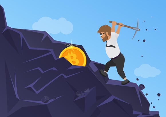 An illustration of a man mining a bitcoin from rock.