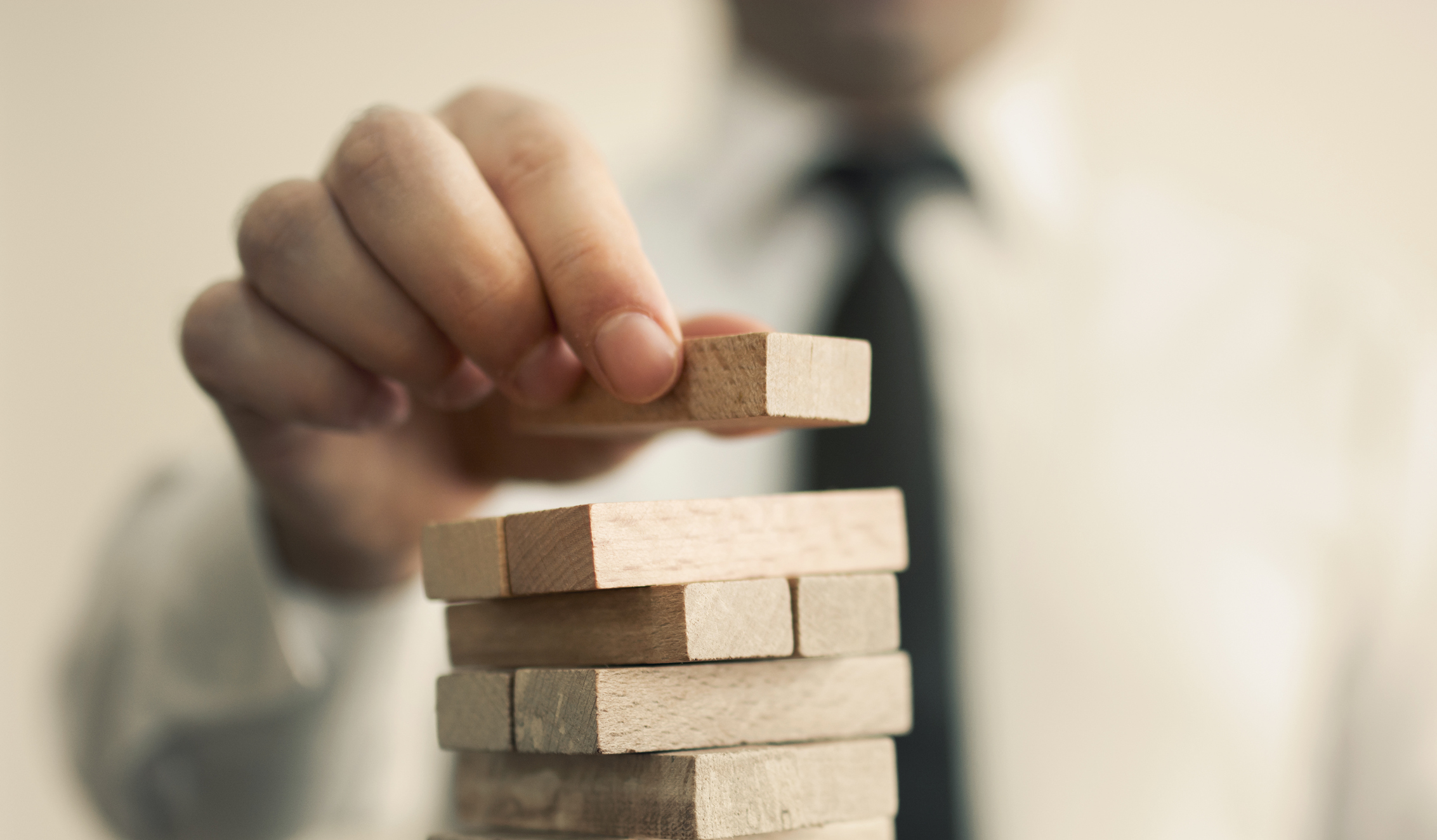 A man building blocks