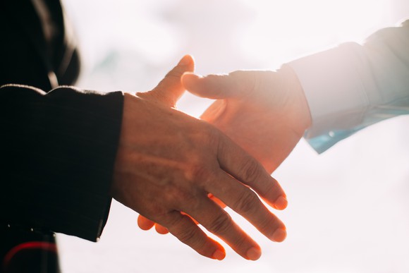 Two people shaking hands