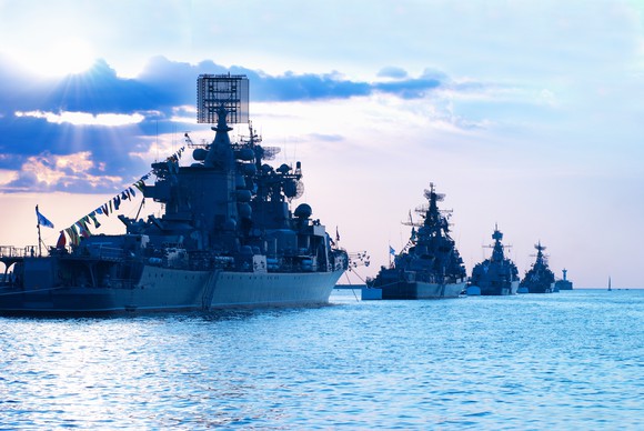Warships sailing in a line