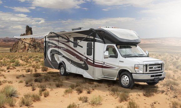 An RV parked in the desert.