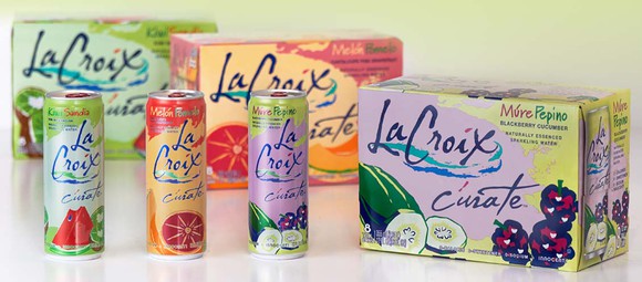 cans of La Croix Curate stands next to a case.