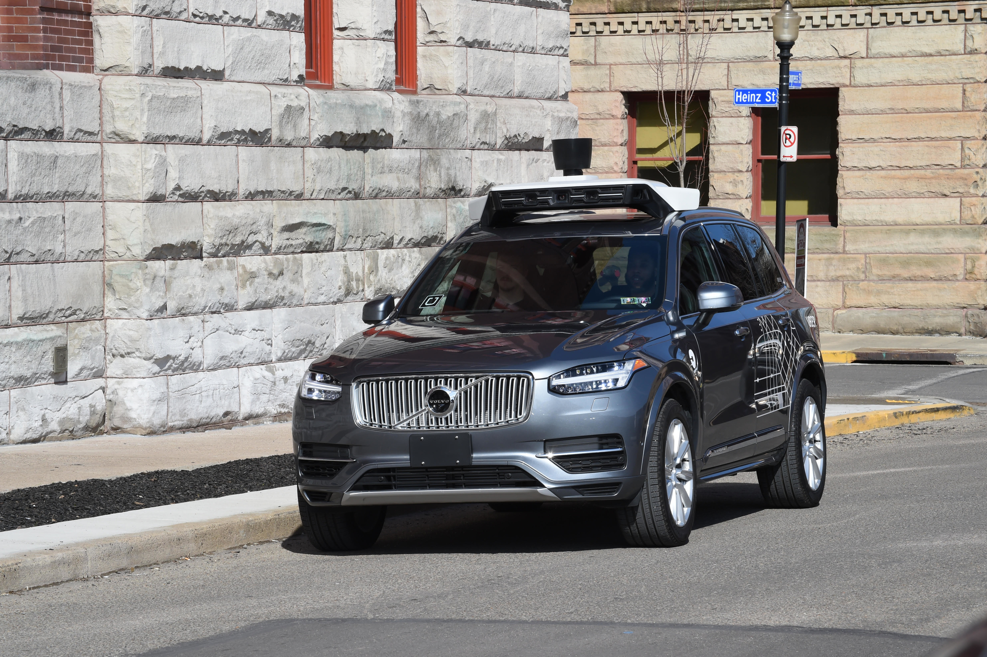 Car equipped with Uber's self driving technology.