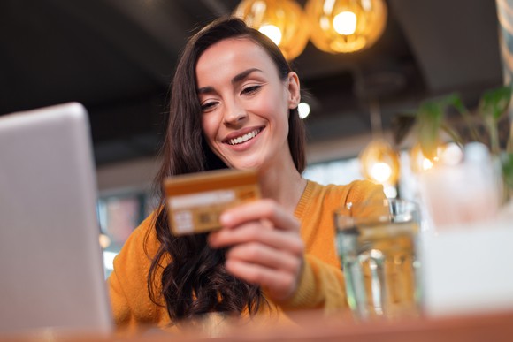 Technologically-savvy shopper paying for an online purchase.