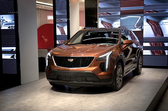 A copper-colored 2019 Cadillac XT4 Sport on display at Cadillac House in New York City.