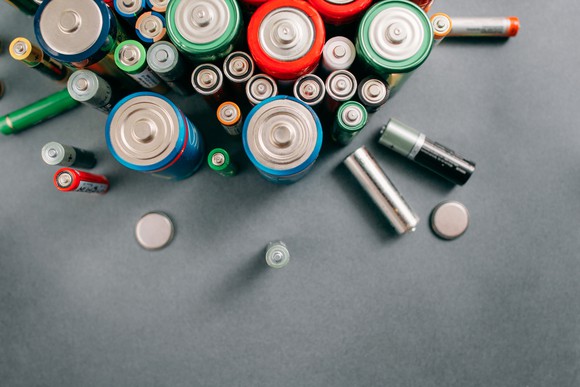 A pile of different sized batteries.