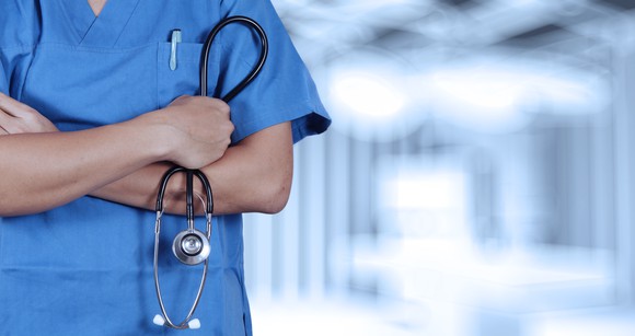 A doctor holding a stethoscope