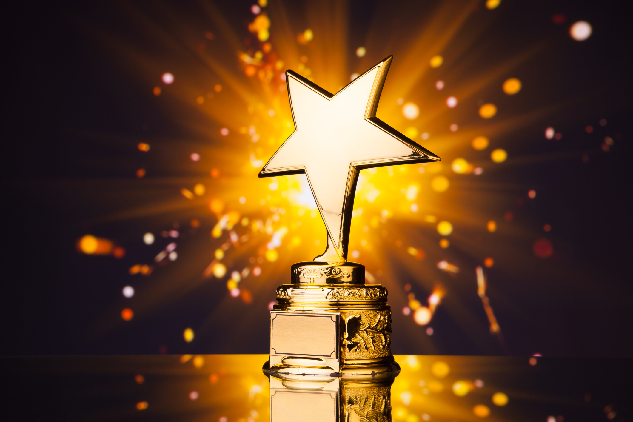 A trophy with a star on top