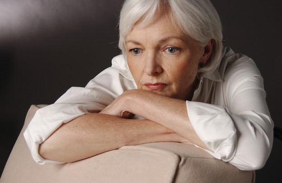 A concerned senior woman.