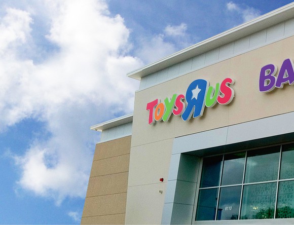 Partial view of the outside of a Toys R Us store