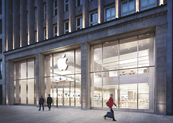 People walking outside an Apple Store