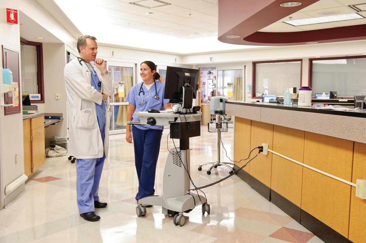 Medical staff in hallway of hospital.