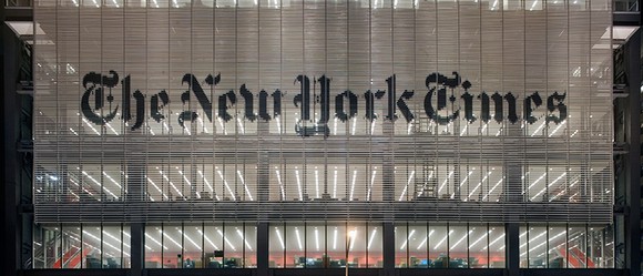 Evening view of the New York Times' headquarters exterior.