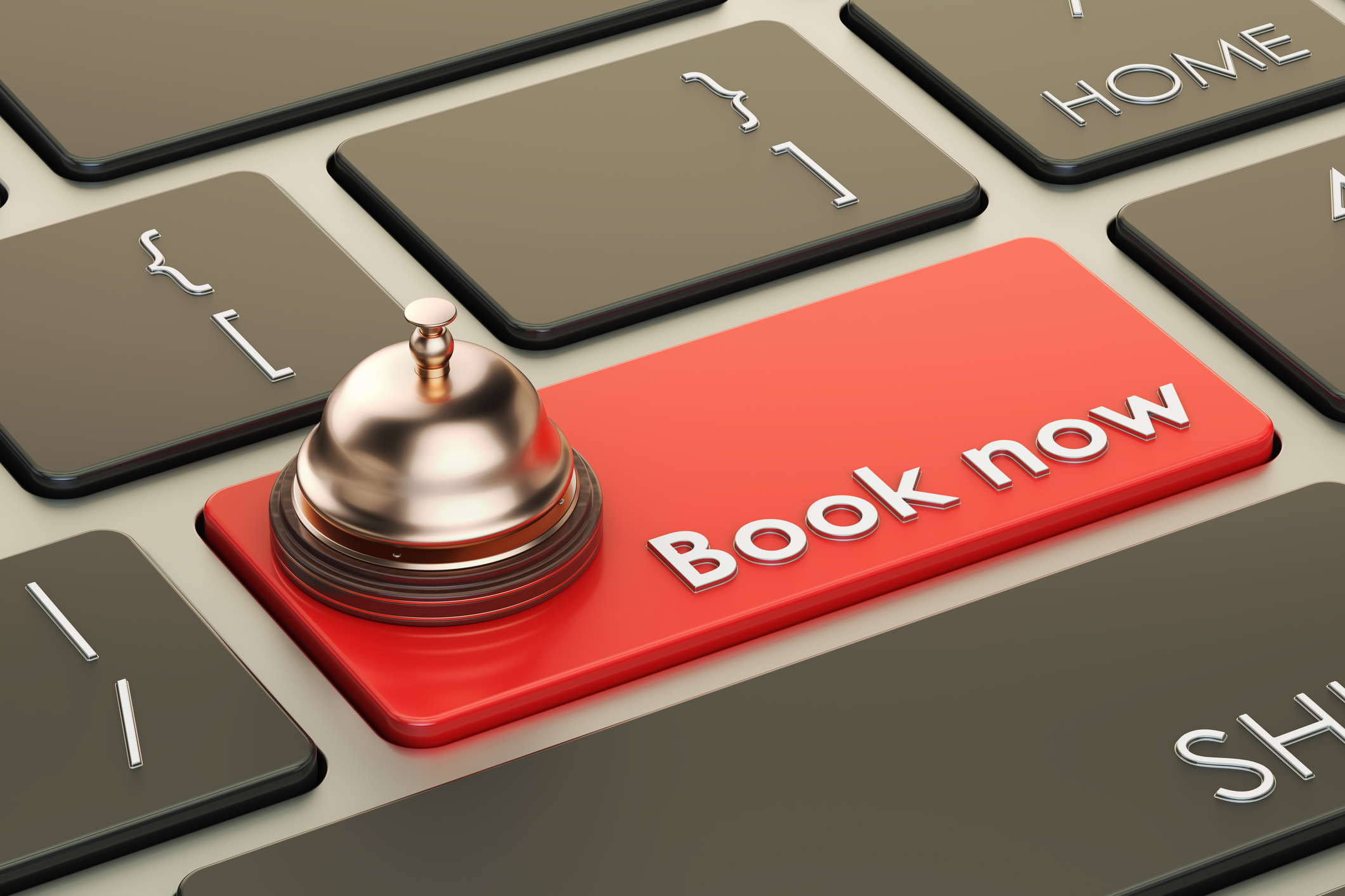 A keyboard with the Enter key replaced with a key that says Book now.