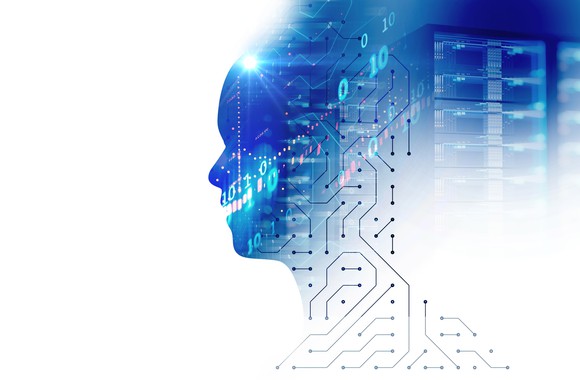 A person's facial profile overlaid on a digital background -- concept for AI.