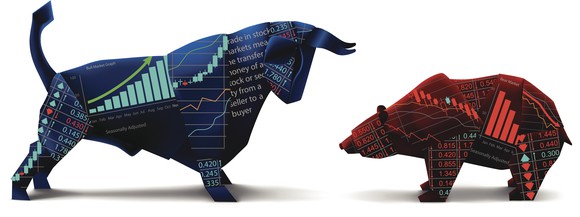 An origami bull towering over a cowering bear