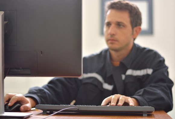 Man sitting at a computer