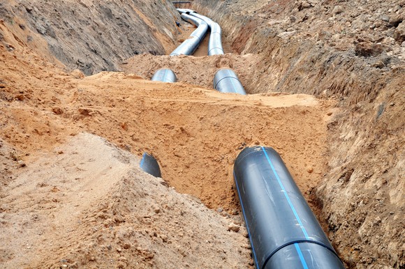 New water lines getting covered with dirt.