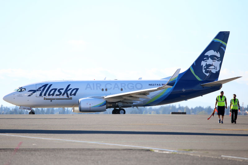 View of Alaska cargo freighter on tarmac.