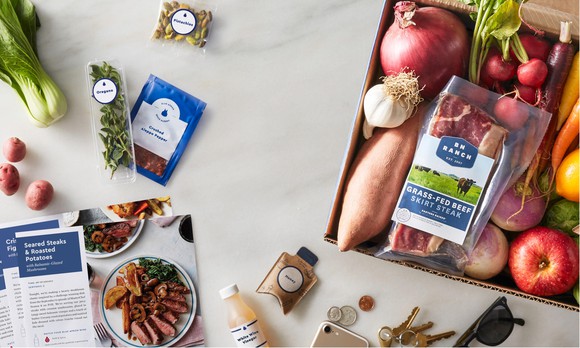 A selection of ingredients and recipe cards from Blue Apron