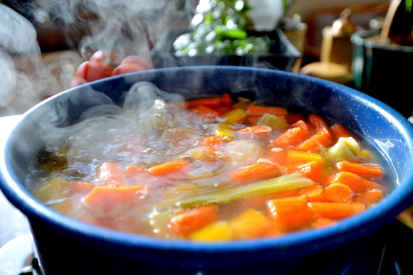 A steaming bowl of soup.