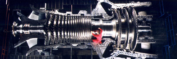 a man working o a GE gas turbine