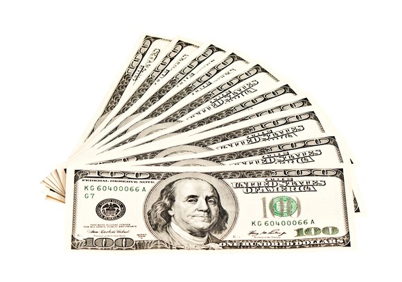 10 $100 bills fanned out.