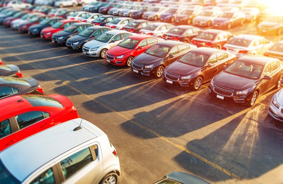 A sales lot full of cars.