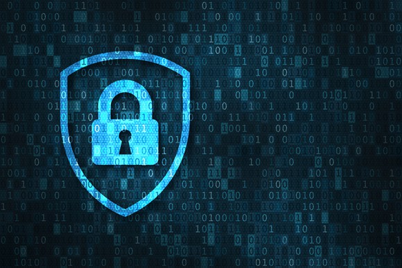 A digital lock in a shield overlaying binary code.