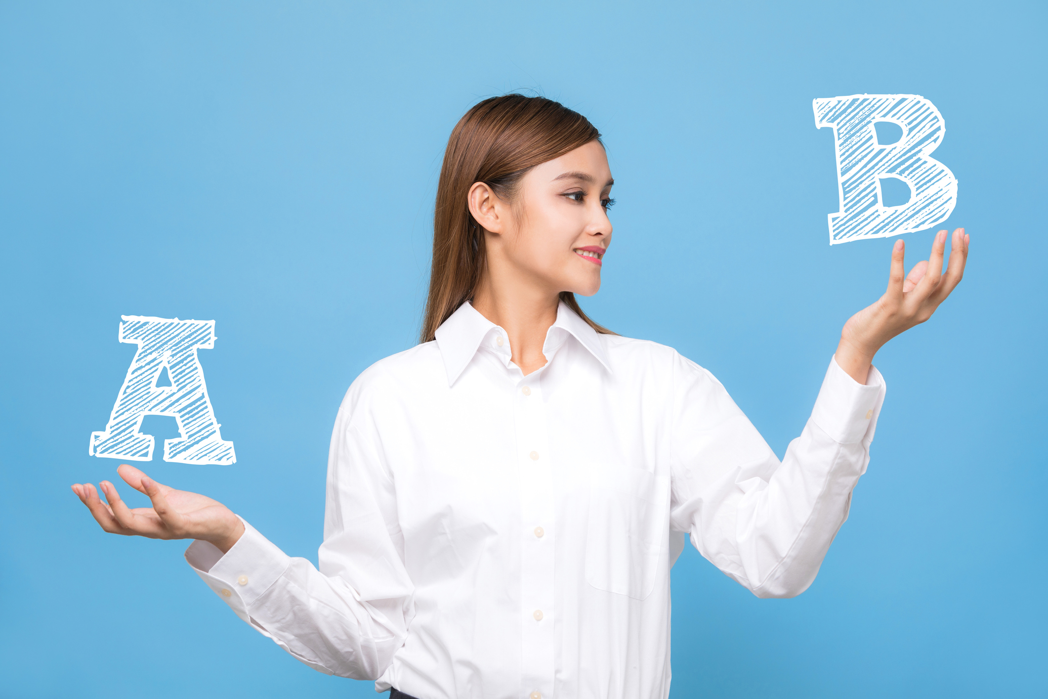 Young woman comparing animated letters A and B.