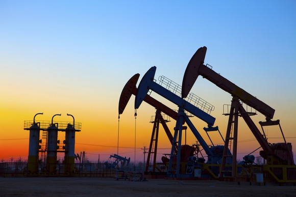 Oil pumping unit at sunset.