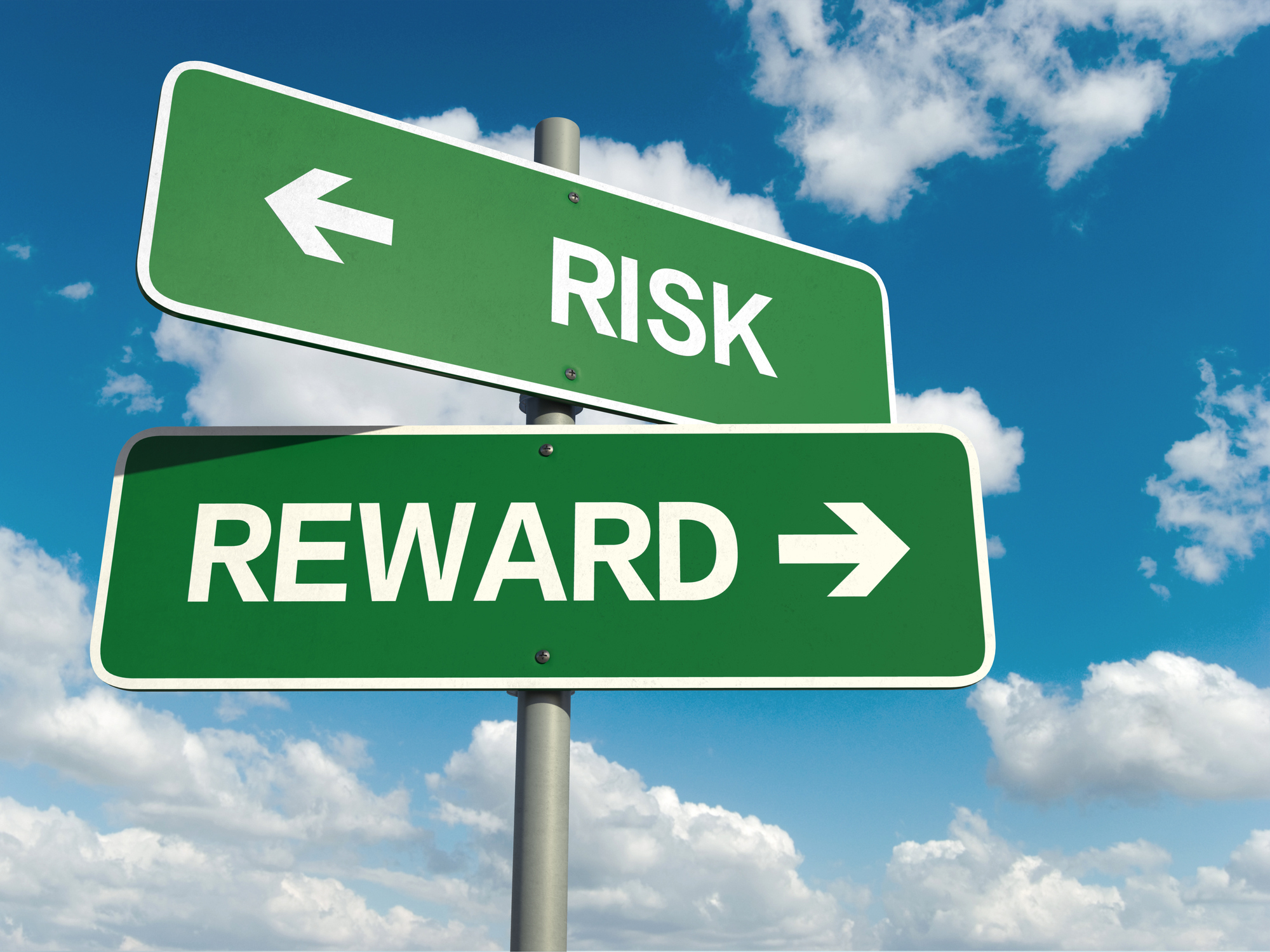 A road sign saying reward pointing right, and another saying risk pointing left.