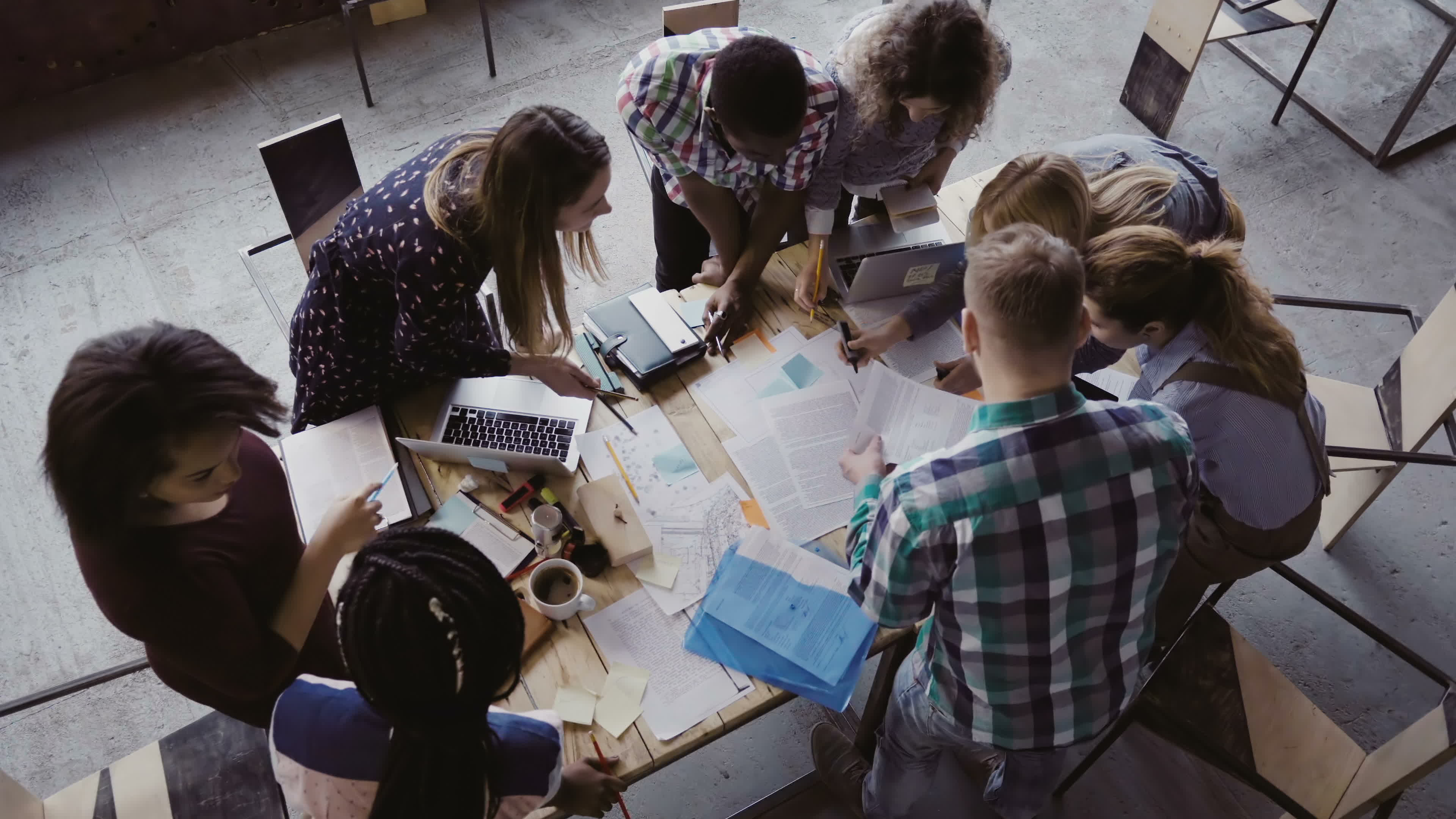 Group of younger workers at a table