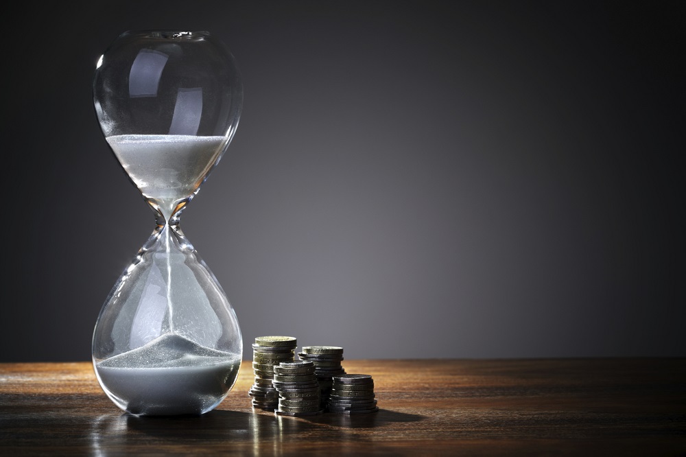Time money hourglass coins