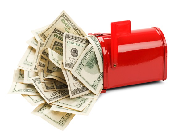 red mailbox stuffed full of hundred dollar bills