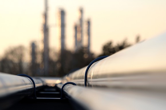 A pipeline heading into a refinery.