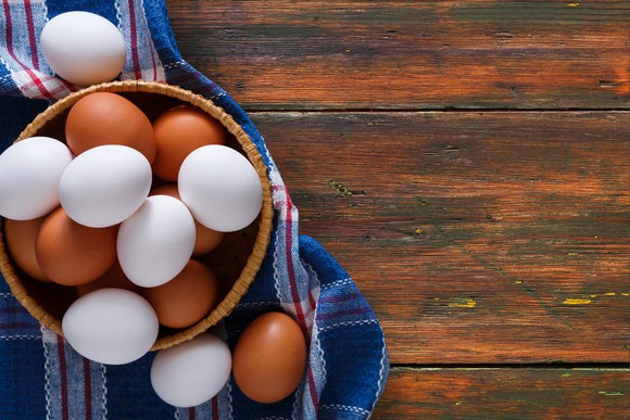 Eggs in a bowl on a table.