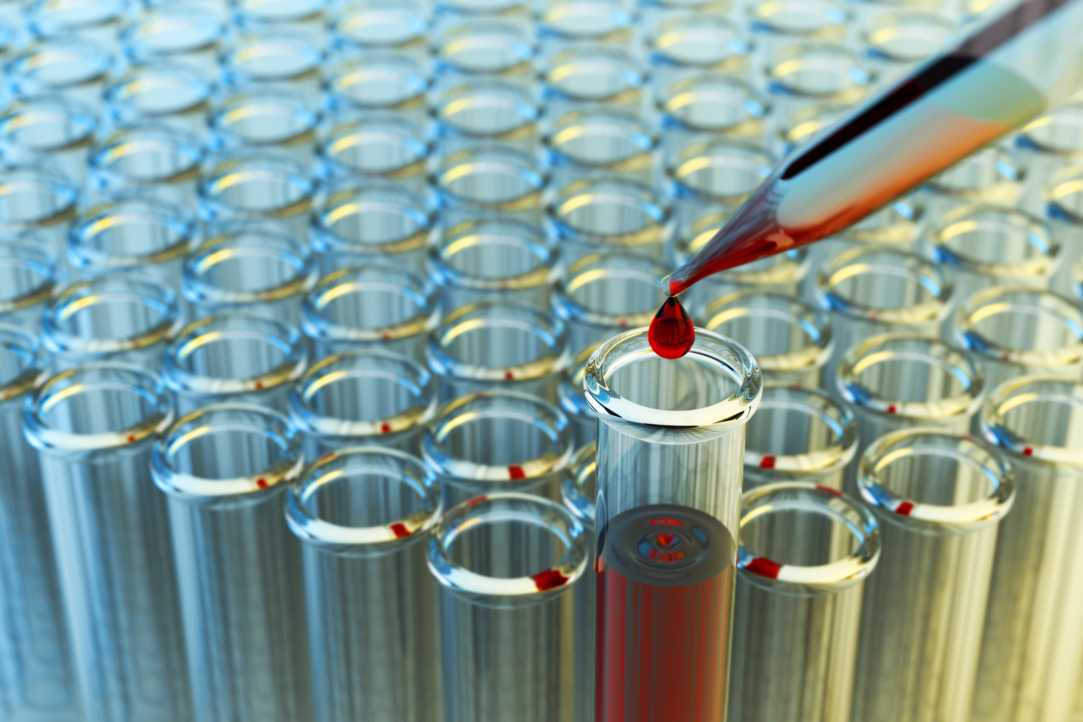 Eyedropper and rows of test tubes.